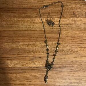 Necklace and earrings. Brown with flower and stones